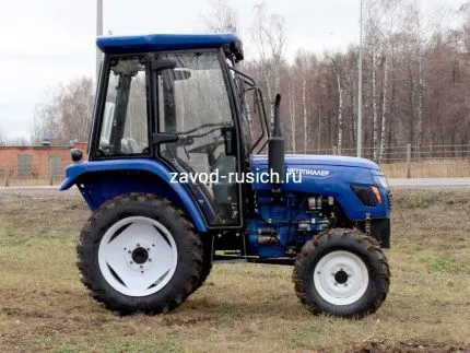 Трактор Четрпиллер XT-404 с кабиной